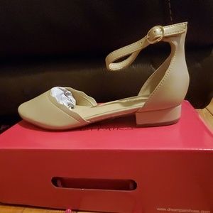 Never worn nude 1/2 inch heels